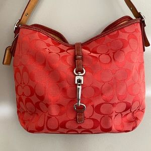 Coach purse. Dark reddish coral